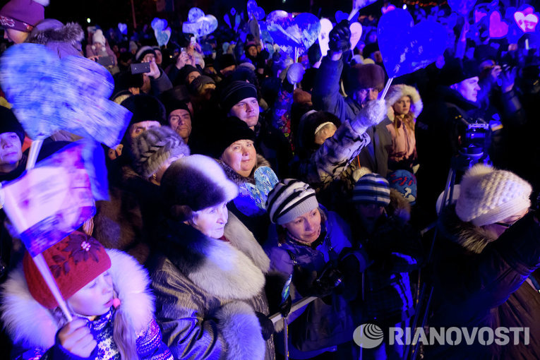 Огонь Паралимпиады в Северске: аншлаг на центральном проспекте Огонь Паралимпиады в Северске: аншлаг на центральном проспекте